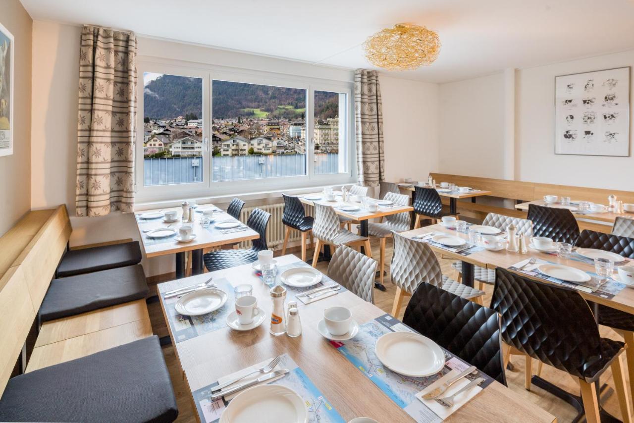 Hotel Merkur - West Station Lodge Interlaken Bagian luar foto
