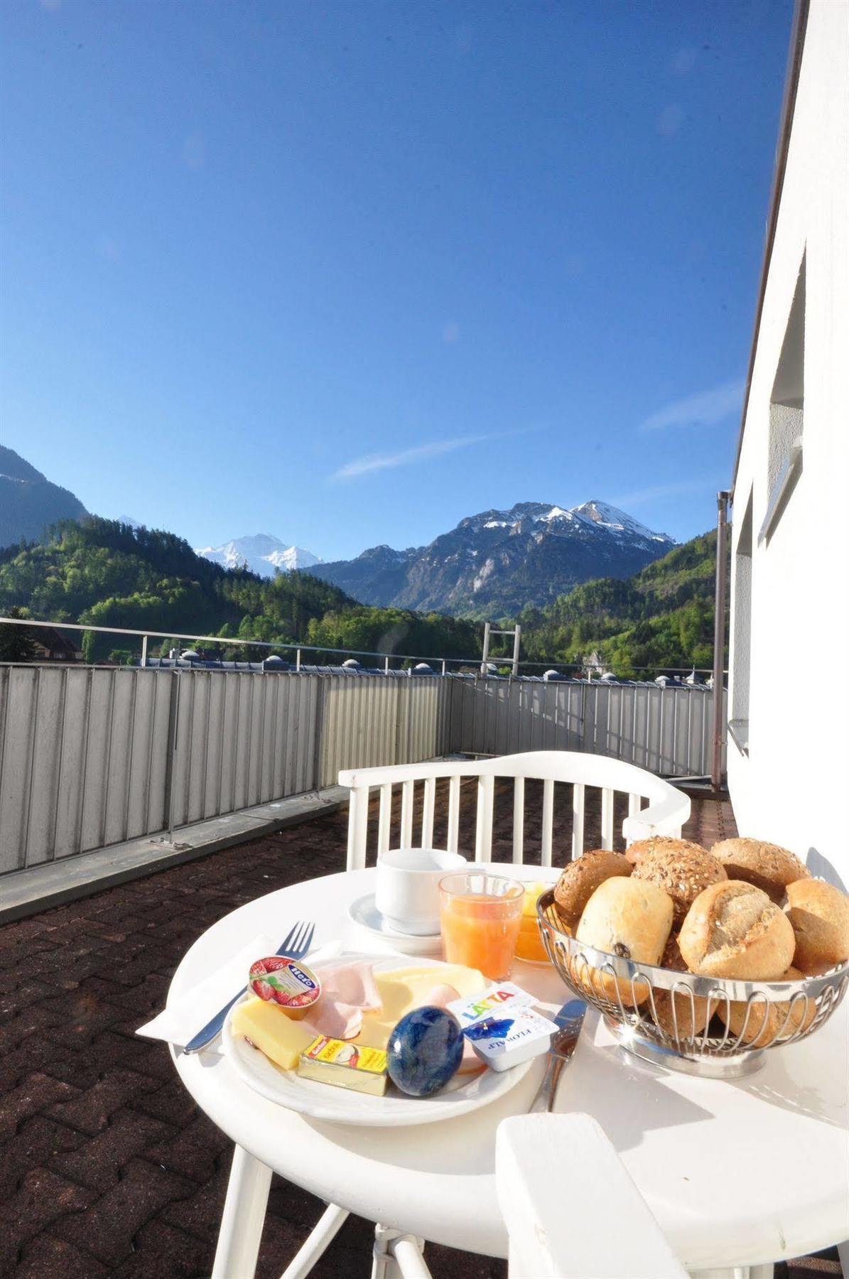 Hotel Merkur - West Station Lodge Interlaken Bagian luar foto